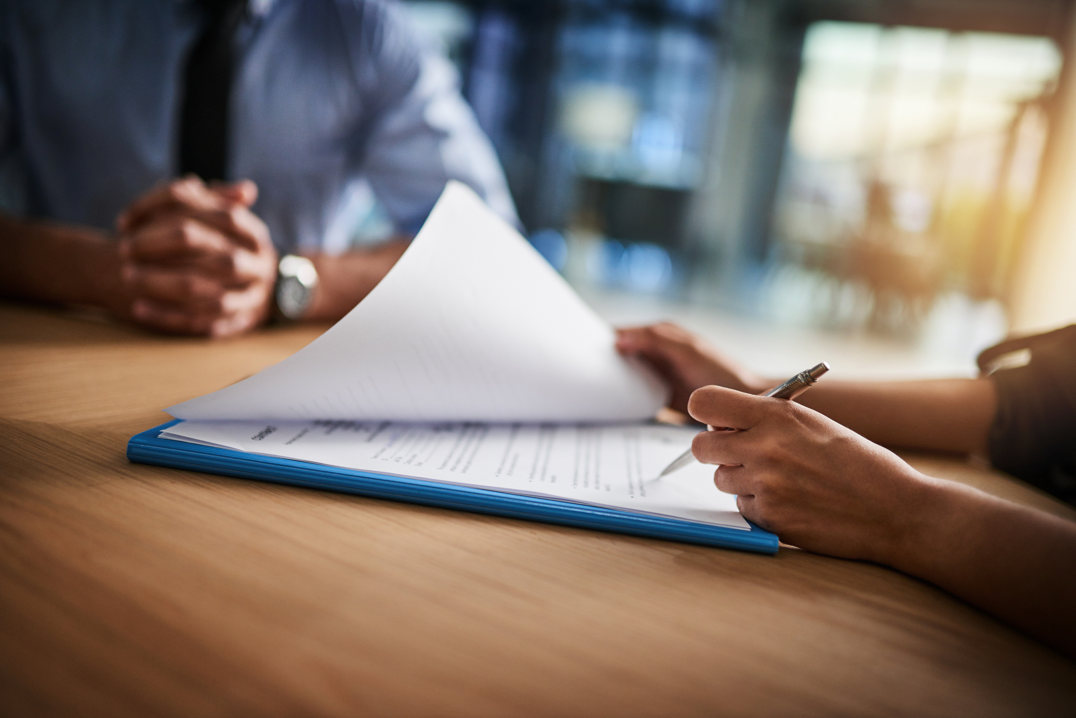 business woman reviewing business interruption insurance